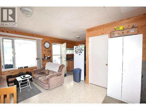 Bedroom 2 is through the door on your right in the photo. Currently used as storage - 1 Imtil Road, Vernon, BC - Indoor