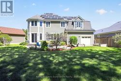 rear yard (note garage drive-thru door) - 