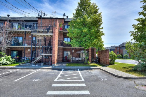 Face arrière - 5268 Av. Eliot, Laval (Chomedey), QC - Outdoor With Balcony With Facade