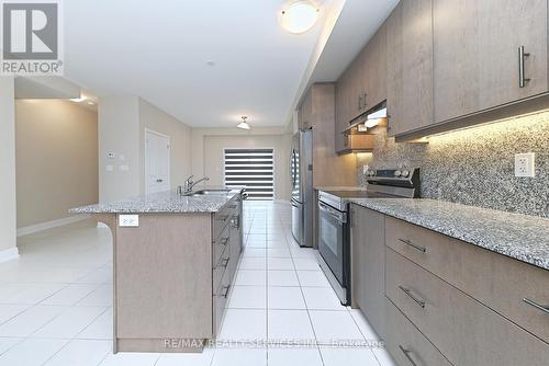 52 HUMBERSTONE DRIVE  Halton Hills, ON L7G 0P6