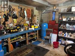 Basement shop area. - 