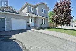 Extra parking with interlock patio stones. - 