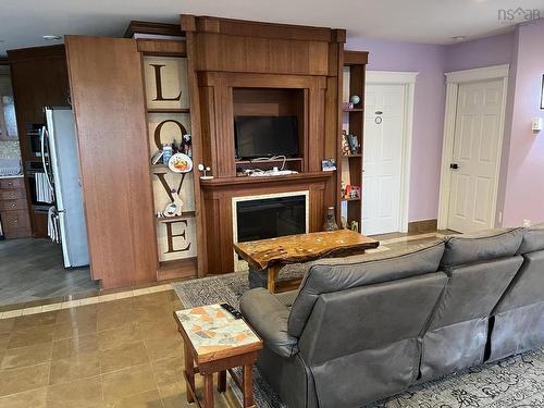 9 Brightman Avenue, Currys Corner, NS - Indoor Photo Showing Living Room With Fireplace
