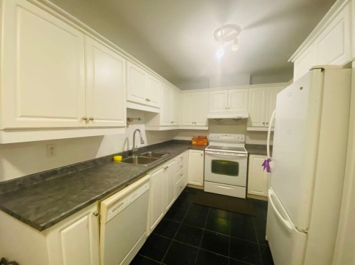 Kitchen - 6792 Rue Marie-Guyart, Montréal (Lasalle), QC - Indoor Photo Showing Kitchen With Double Sink