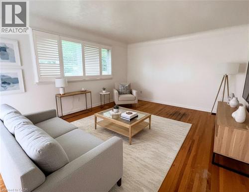 Virtually Staged - 83 East 41St Street, Hamilton, ON - Indoor Photo Showing Living Room