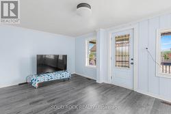 Huge living room with crown moulding! - 
