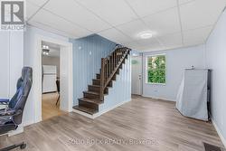 Dining/office has steel door leading to side yard - 