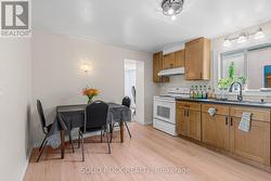 Kitchen with hickory shaker cabinets. - 