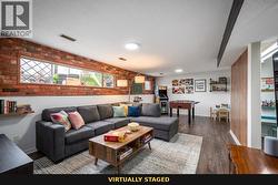**virtually staged** Family room downstairs - 