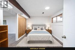 **virtually staged** Fifth bedroom downstairs (no closet/needs door) - 
