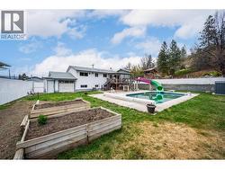 Garden beds are an added backyard bonus! - 