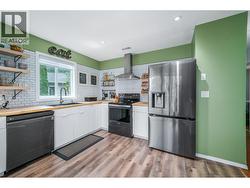 Stylishly updated kitchen featuring contemporary finishes! - 