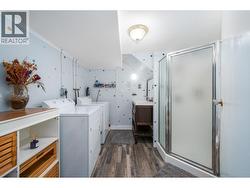 Super cute bathroom downstairs complete with it's own laundry! - 
