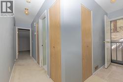 Upper hallway to door leading to back of house - 