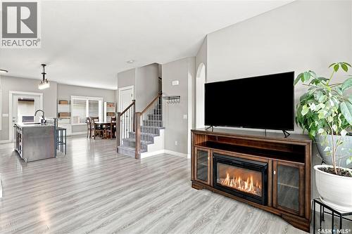 835 Lamarsh Lane, Saskatoon, SK - Indoor Photo Showing Living Room With Fireplace