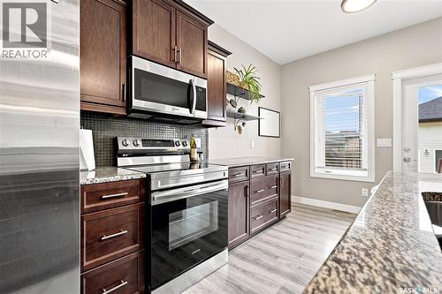 835 Lamarsh Lane, Saskatoon, SK - Indoor Photo Showing Kitchen With Double Sink