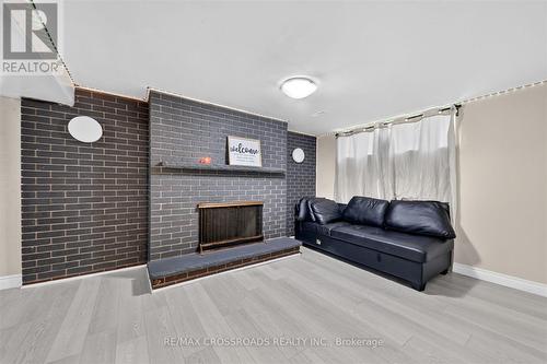 10 Gillbank Crescent S, Toronto, ON - Indoor Photo Showing Living Room With Fireplace