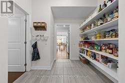 Mudroom with walking pantry - 