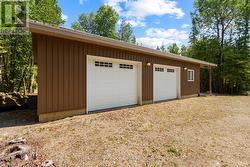 Stand-out 30' x 40' Garage with carport! - 