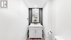 Lower level powder room - 