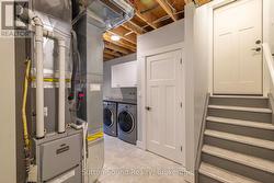 Lower Level Laundry with Access to Garage - 