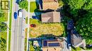 Expansive lot featuring a cleared building envelope, mature perimeter trees, and direct road frontage - 153 Courtland Avenue E, Kitchener, ON 