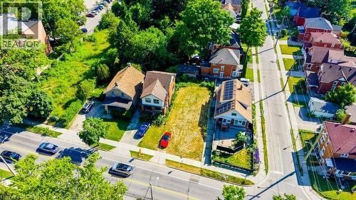 Expansive developable lot situated on a corner, bordered by existing residential properties - 153 Courtland Avenue E, Kitchener, ON 
