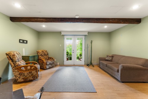 Salle familiale - 48 Ch. Des Diligences, Austin, QC 