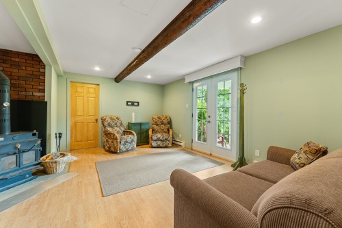 Salle familiale - 48 Ch. Des Diligences, Austin, QC 