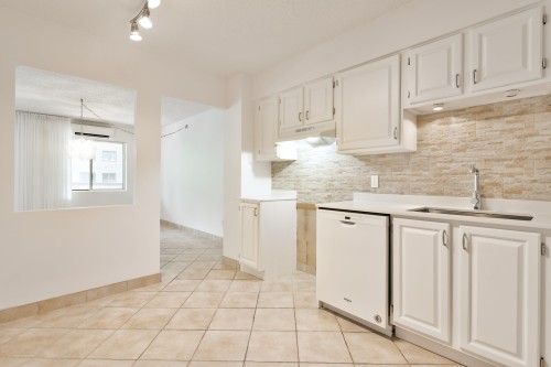 Kitchen - 106-7060 Av. Giraud, Montréal (Anjou), QC - Indoor Photo Showing Kitchen
