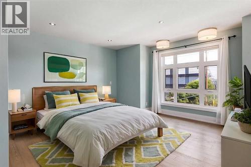 Virtually staged primary bedroom #1 - 1513 23 Avenue Sw, Calgary, AB 