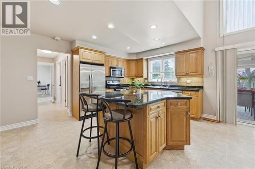 Primary Kitchen, bright, spacious, with deck access - 1 Idared Road, Carlisle, ON - Indoor Photo Showing Kitchen