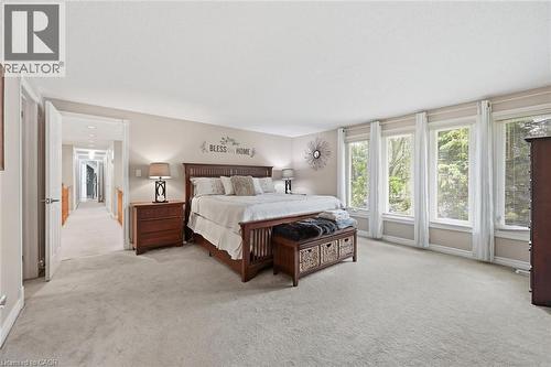 Primary Bedroom with ample natural light, huge walk-in-closet, and gorgeous ensuite washroom - 1 Idared Road, Carlisle, ON - Indoor Photo Showing Bedroom