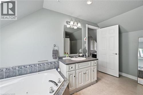 Walk through, semi-ensuite bathroom with separate toilet room - 1 Idared Road, Carlisle, ON - Indoor Photo Showing Bathroom