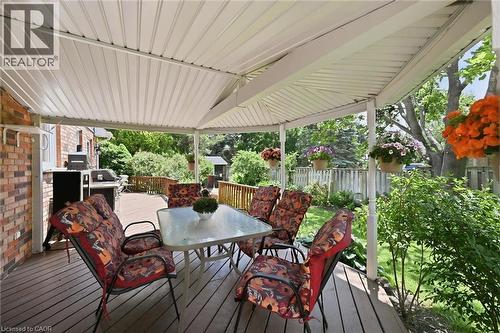Covered sitting area on a beautiful deck with plenty of space for entertaining and outdoor cooking - 1 Idared Road, Carlisle, ON - Outdoor With Deck Patio Veranda With Exterior