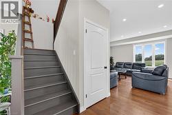 Hardwood flooring throughout the main living area - 