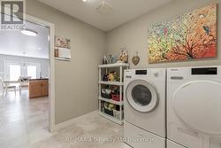 Laundry Room off the Kitchen & Garage - 