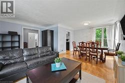 Hardwood flooring throughout the main living and dining areas - 