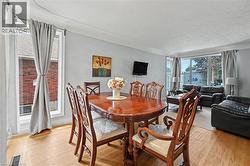 Light-toned wood-finish flooring complements the light wall color - 