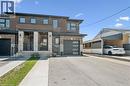 Contemporary multi-level exterior with brick and horizontal siding accents - 63 Plymouth Road, Kitchener, ON 
