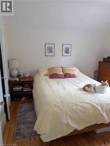 Hardwood flooring complements light-toned walls - 15 Martin Street, Kitchener, ON 