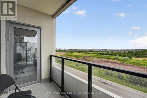 622 - 3200 William Coltson Avenue, Oakville, ON - Outdoor With Balcony With Exterior