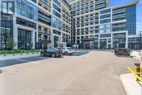 622 - 3200 William Coltson Avenue, Oakville, ON - Outdoor With Balcony With Facade