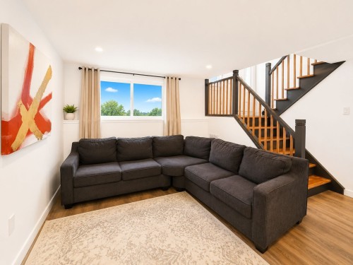 Salle familiale - 117 Rue Hébert, Châteauguay, QC - Indoor Photo Showing Living Room