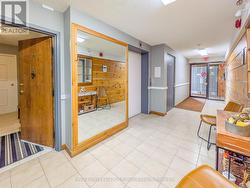 Building Hallway, Elevator, & Unit Entrance - 