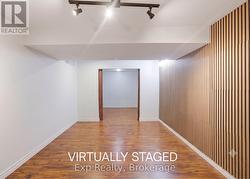 Virtually staged, bedroom in lower level - 