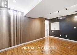Virtually staged, bedroom in lower level - 