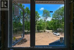 Kitchen window view of future driveway - 