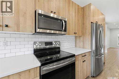 1402 Wiggins Avenue S, Saskatoon, SK - Indoor Photo Showing Kitchen With Upgraded Kitchen