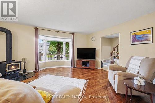 30 Bartley Crescent, Ottawa, ON - Indoor Photo Showing Living Room With Fireplace